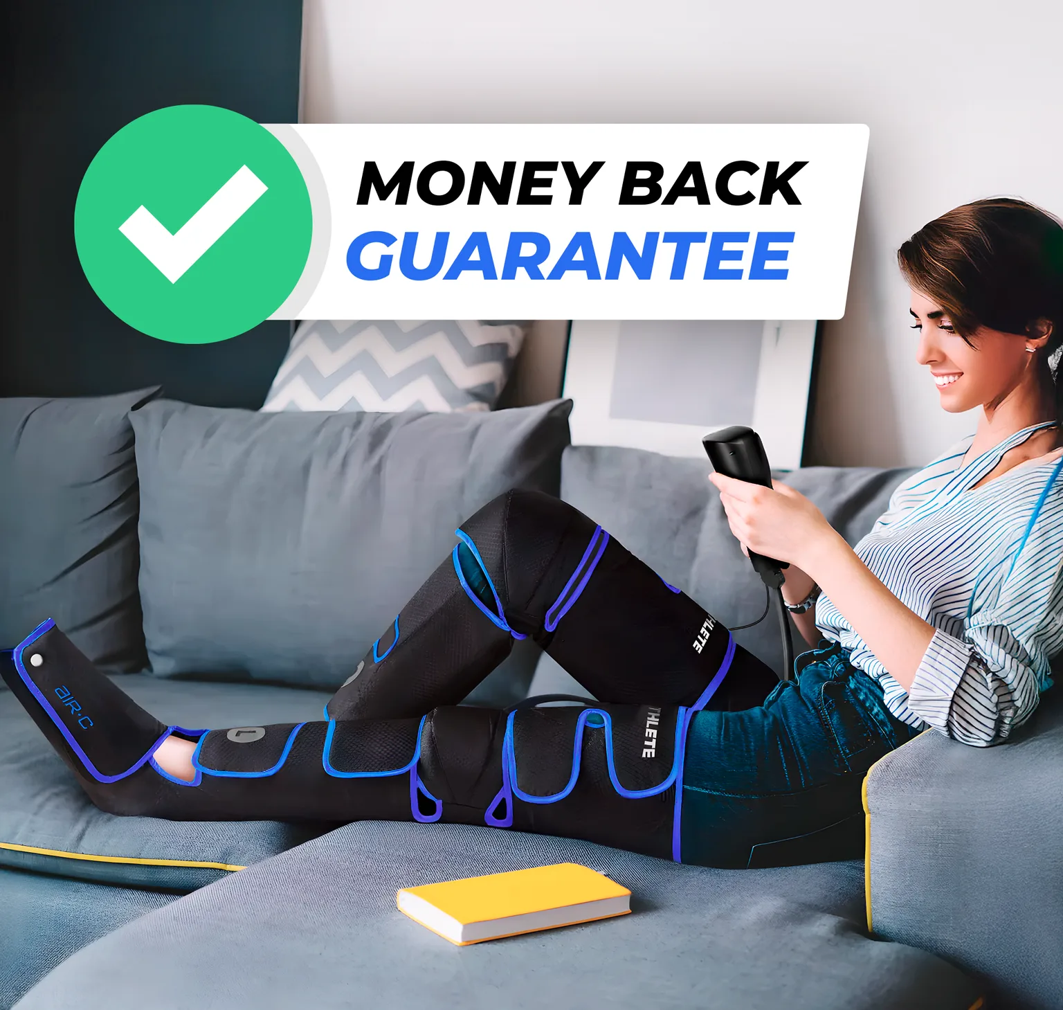 Person relaxing on a couch using Air-C leg massager and holding the controller