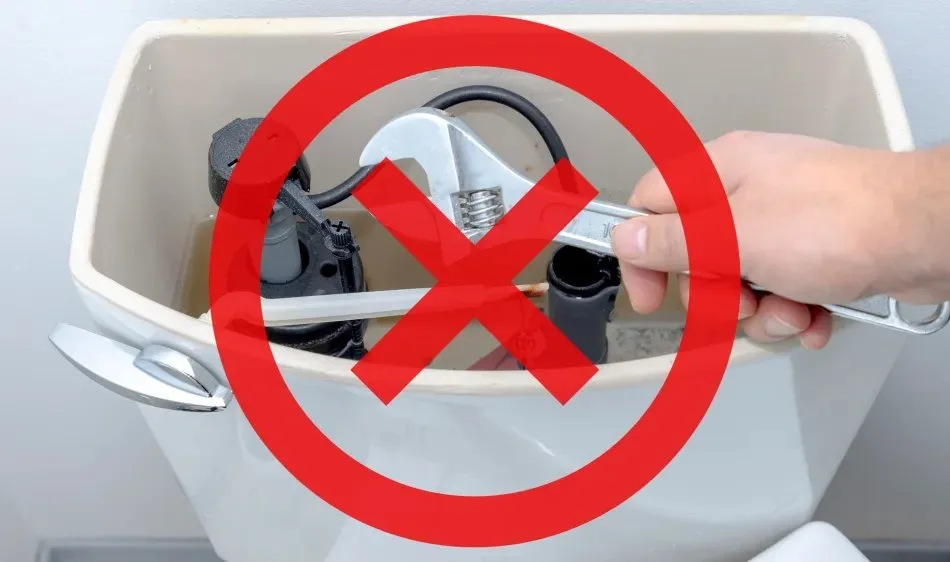 Placing a cleaning tablet into a blue toilet tank cleaner holder