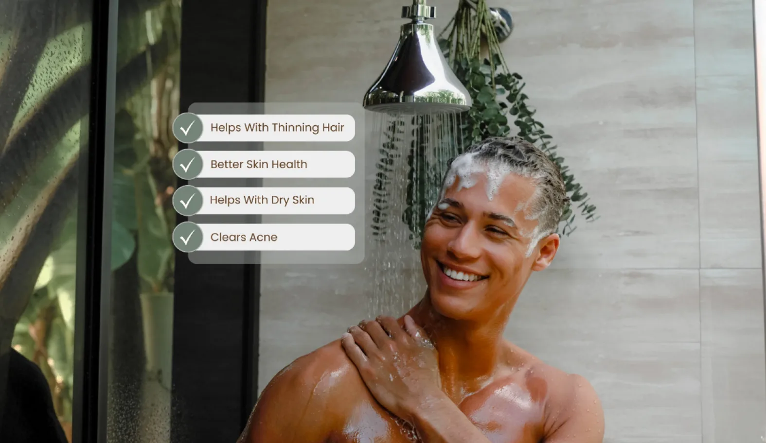 Person showering with NUUD filtered showerhead