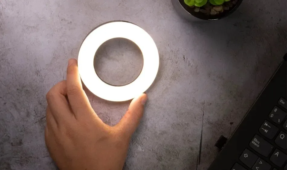 Close-up of a ring light showing its internal LED components and outer diffuser