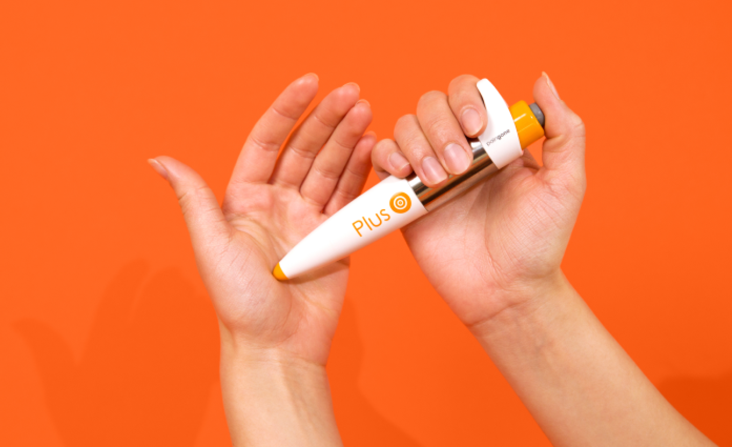 Paingone Plus device being used near the wrist