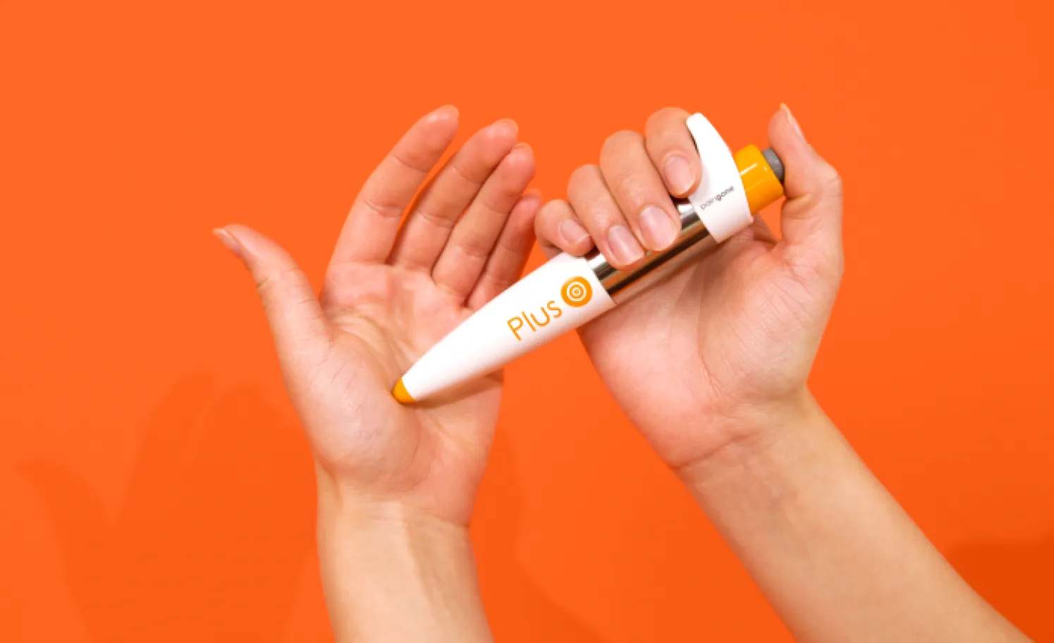 Paingone Plus device being used near the wrist