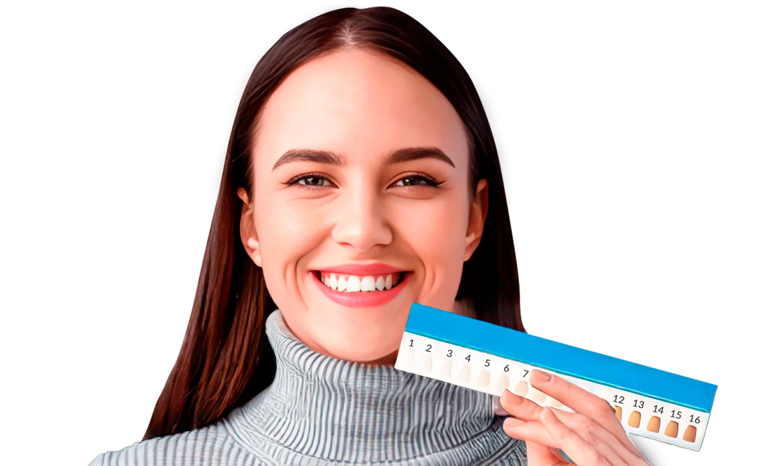 A smiling person holding a teeth shade guide next to their mouth