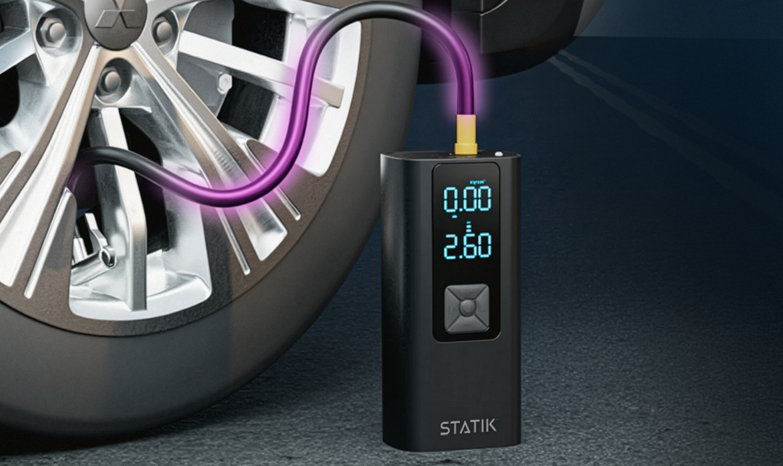 TireHero air compressor connected to a car tire, digital display illuminated