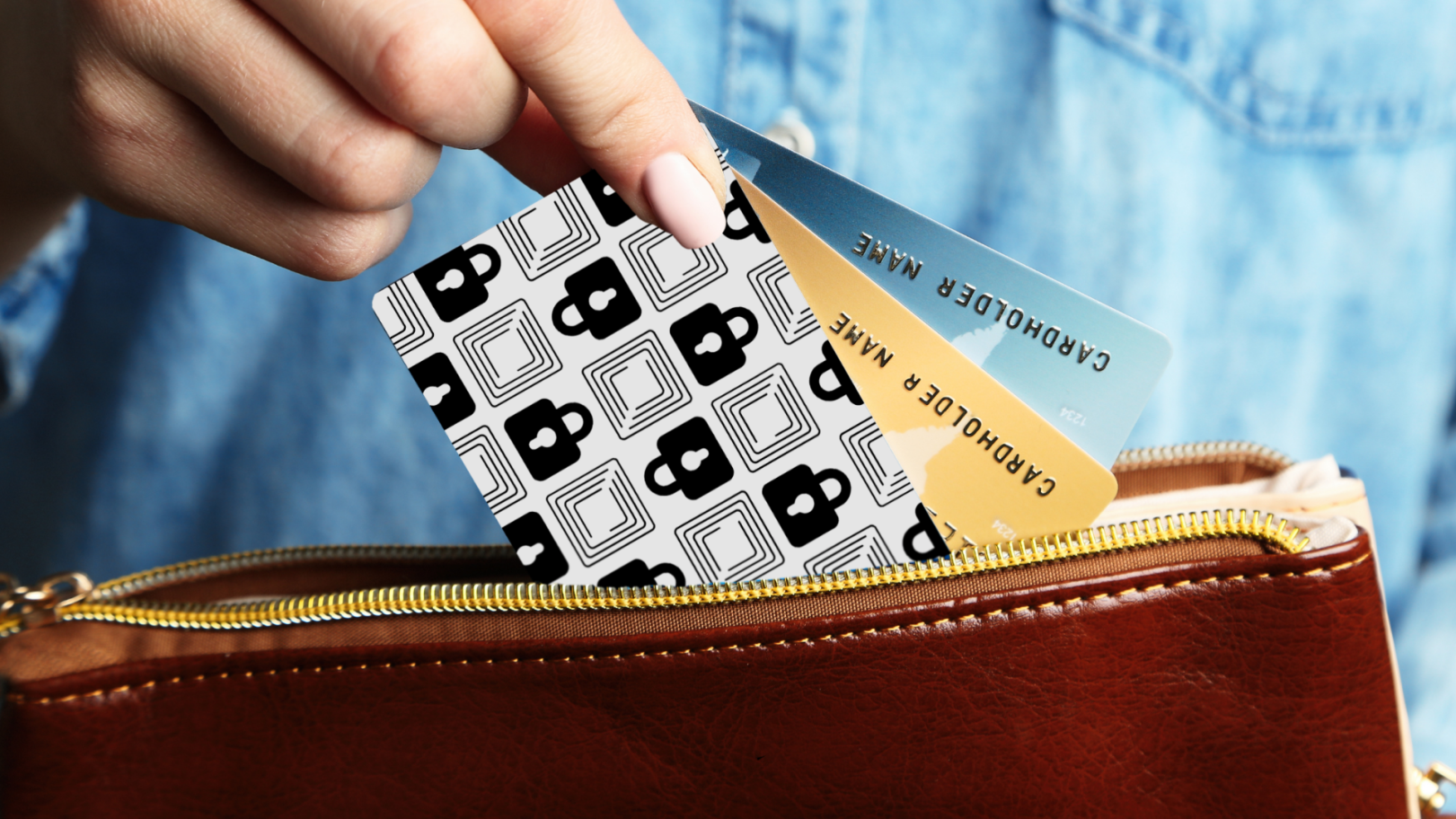 A person placing the Wallet Defender card into a wallet alongside credit cards